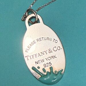 Tiffany & Co. Silver Tag with Teal Accent
